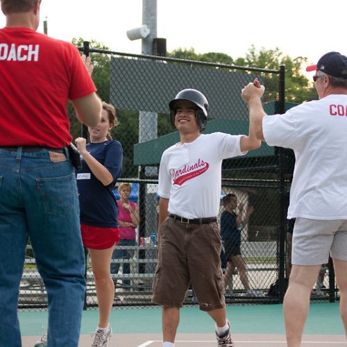 Coach high-fiving player